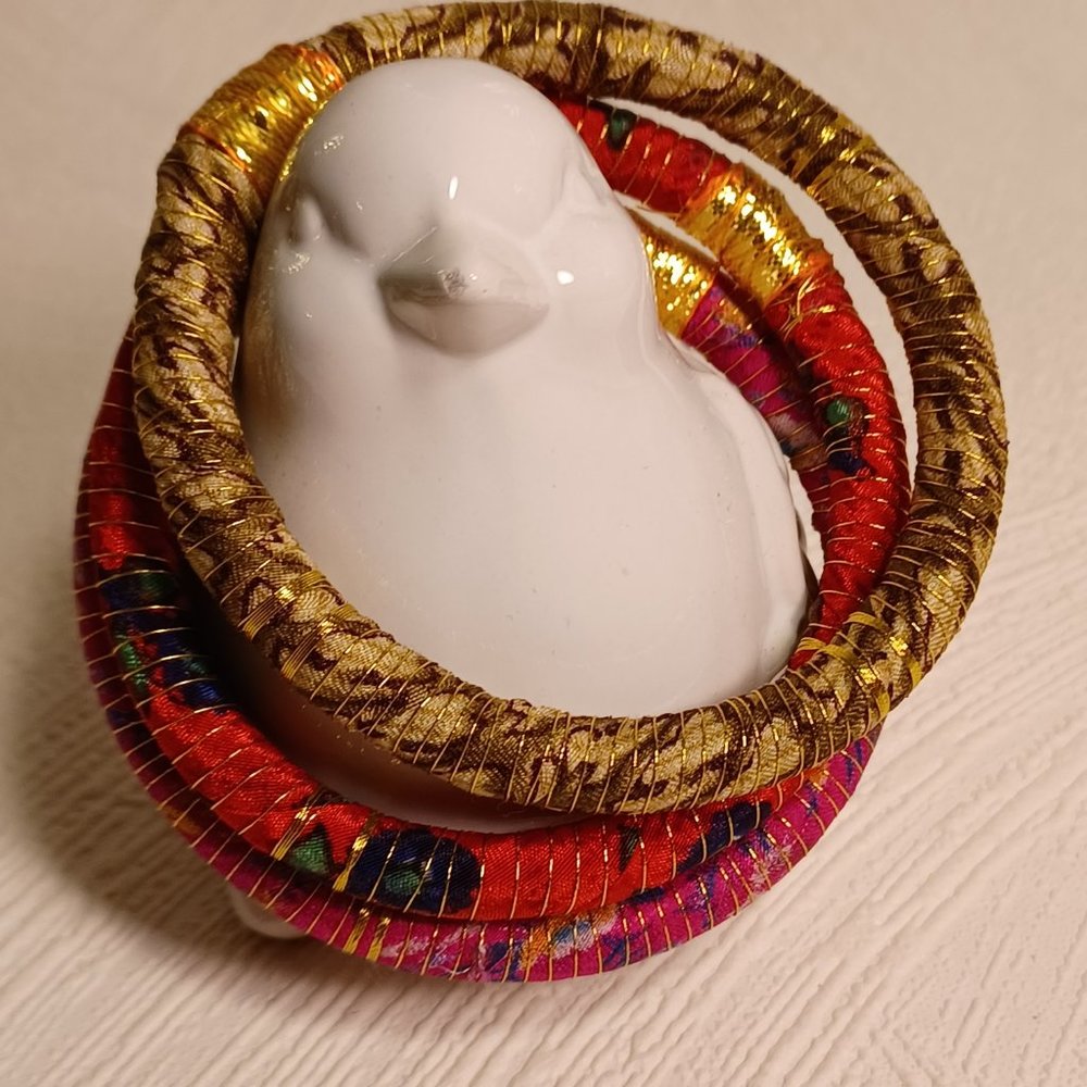 Bracelet Woven and braided bracelets (3) with gold string overlay